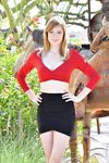 Freckled redhead hikes her black skirt over her white panties in public